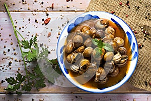 Spanish caracoles en salsa, cooked snails in sauce