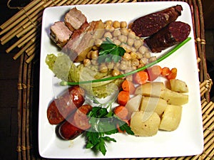 Spanish cocido madrileno, stew typical of madrid photo