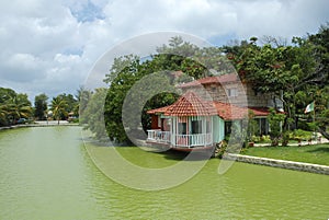 Spanish cottage by the side of a canal