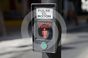 Spanish crosswalk button photo