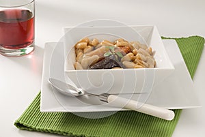 Spanish Cuisine. Asturian ham and beans. photo