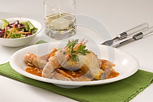 Spanish cuisine. Chicken and langoustines.