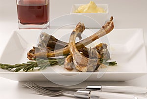 Spanish cuisine. Grilled lamb spares. photo