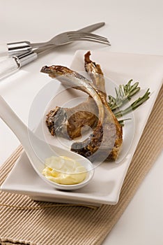 Spanish cuisine. Grilled lamb spares. photo