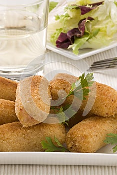 Spanish cuisine. Ham croquettes. photo