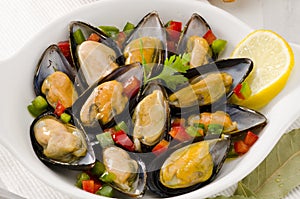 Spanish Cuisine. Mussels in Sauce. Mejillones a la Marinera.