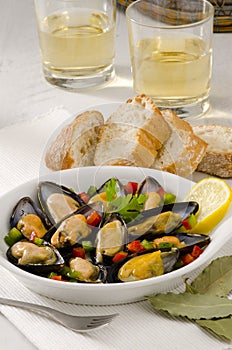 Spanish Cuisine. Mussels in Sauce. Mejillones a la Marinera. photo