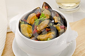Spanish Cuisine. Mussels in Sauce. Mejillones a la Marinera. photo