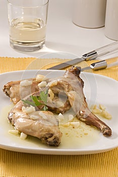 Spanish cuisine. Rabbit in garlic sauce. photo