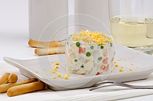 Spanish Cuisine. Russian salad. Ensaladilla rusa. photo