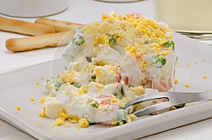 Spanish Cuisine. Russian salad. Ensaladilla rusa. photo