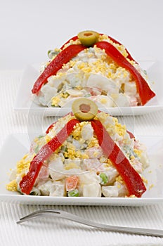 Spanish Cuisine. Russian salad. Ensaladilla rusa. photo