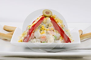 Spanish Cuisine. Russian salad. Ensaladilla rusa. photo