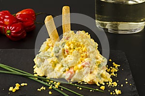 Spanish Cuisine. Russian salad or Olivier Salad.Ensaladilla rusa photo