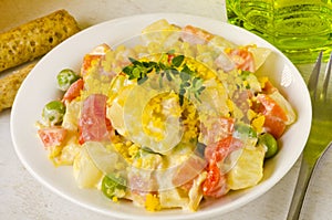 Spanish Cuisine. Russian salad or Olivier Salad.Ensaladilla rusa photo