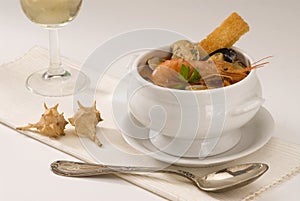 Spanish cuisine. Seafood soup. photo