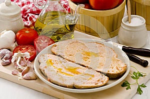 Spanish Cuisine. Tomato bread. Pa amb tomaquet. photo