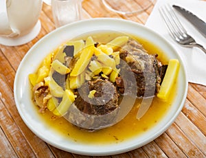 Fried pork with potatoes photo