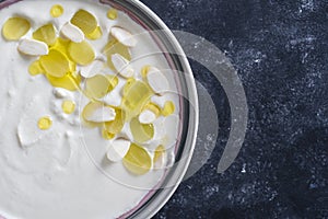 Spanish dish, cold soup ajo blanco or ajoblanco from garlic, almonds, white wine vinegar, olive oil and grapes