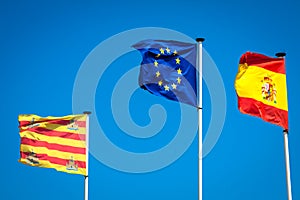 Spanish and European flags waving in the wind