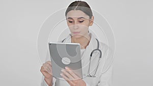 Spanish Female Doctor doing Video Chat on Digital Tablet on White Background