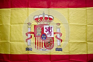 Spanish flag with shield and royal crown. Constitutional monarch