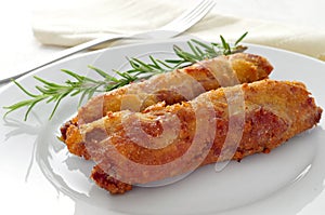 spanish flamenquines, breaded pork loin rolled with serrano ham, typical of Andalusia