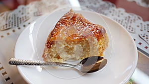 A slice of Spanish flan de leche known as Quesillo in the Canary Islands photo
