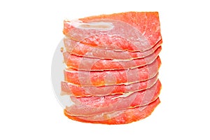 Spanish food. Closeup of pieces of sliced ery spanish ham Jamon Serrano or italian parma prosciutto crudo isolated on a white