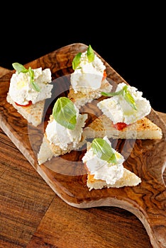 Spanish food tapas. Toasted bread with fresh cheese