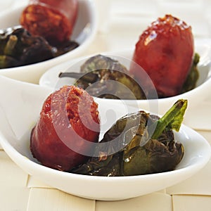 Spanish fried chorizo and Padron peppers served as tapas photo
