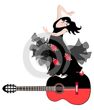 Spanish girl in a black dress with red roses is dancing flamenco on big guitar. Shawl in the form of a fairy-tale bird