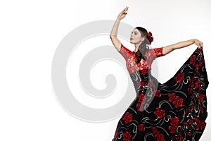 Spanish girl flamenco dancer on a light background. free space for your text