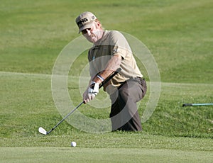 Spanish golfer Miguel Angel Jimenez hitiing the ball wide