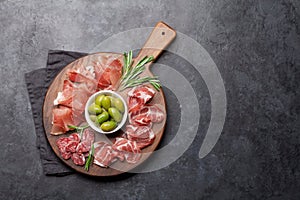 Spanish jamon, prosciutto crudo, italian salami, parma ham photo