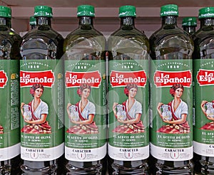 spanish La Espanola olive oil bottles in a supermarket