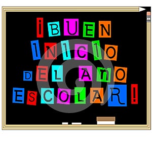 In Spanish language Good start to the school year written in all colors on a school blackboard