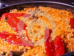 Spanish meat homemade paella. Closeup photo