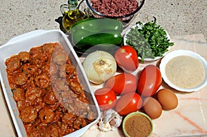 Spanish meatballs and ingredients. photo