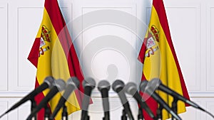 Spanish official press conference. Flags of Spain and microphones. Conceptual animation