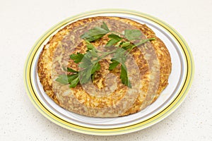 Spanish omelette with parsley photo