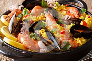 Spanish paella meal with seafood shrimp, mussels, fish, and baby