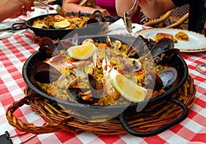 Spanish paella in the pan photo