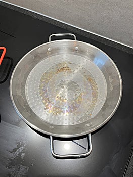 Spanish paella pan on stove