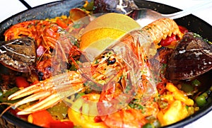 Spanish paella with seafood in a pan