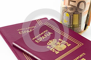 Spanish passport with european union currency banknotes