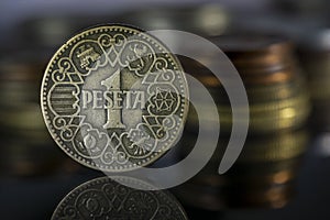1944 Spanish Peseta Coin Stacks Close Up Reflection Macro photo