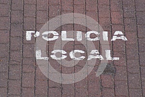 Spanish Road marking sign: Policia Local