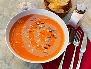 Spanish salmorejo cordobes - typical spanish tomato soup with ham
