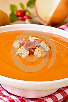 Spanish salmorejo with ham and croutons photo